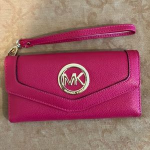 Michael Kors clutch. Pink leather. Brand new never used.